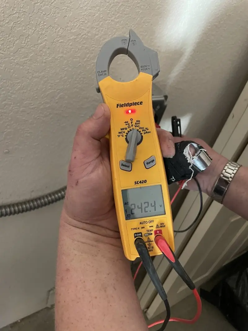 Voltage testing with clamp meter during Circuit Breaker Repair in Bullard